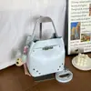 2026 Nova Bolsa de Balde de Nicho de Verão Moda Feminina Bolsa de Ombro Simples Bolsa Transversal Simples Alta Aparência Bolsa para o Dia a Dia