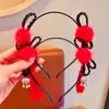 Diadema para el cabello para niños Popular en Internet 2025 Nueva Diadema roja linda de orejas de gato antideslizante para niñas de Año Nuevo