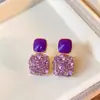 Elegantes aretes cuadrados morados para mujer, aretes de botón de nicho de lujo ligero, nuevo modelo popular 2026, aretes colgantes únicos y elegantes