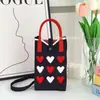 2025 Nueva Bolso de Teléfono Móvil de Punto con Forma de Corazón para Mujer Bolso Cruzado de Hombro Compacto Portátil de Mano para Mujer