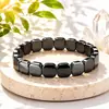 Pulsera de estilo oscuro de moda con un toque de alta gama, popular pulsera cruzada de cuentas de obsidiana negra, accesorio de mano personalizado simple hip-hop
