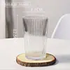 Taza de café rayada de moda, vaso de vidrio con alto valor estético, vaso de agua simple para uso doméstico, vaso de alta gama para bebidas americanas heladas