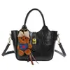 Bolsa Satchel Estilo Balde Popular Casual Retrô para Mulheres Outono Inicial 2025 Estilo Coreano Fashionável Versátil para Roupas de Trabalho Bolsa de Ombro Transversal
