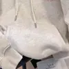 Sudadera con capucha estampada con letras, corte holgado, forro polar, estilo estudiantil, top sencillo de invierno 2026