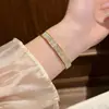 Pulseira com Fecho de Titânio Estilo Novo Europeu e Americano com Quatro Fileiras de Diamantes Estrela Completa para Mulheres ins Leve Luxo Pulseira Exquisita Acessórios de Alto Padrão
