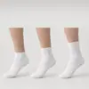 Meias Zhuji para homens, meias esportivas finas de meia-panturrilha para primavera e verão, absorventes de suor, resistentes a odores, antibacterianas, meias longas de algodão de cor sólida para mulheres, atacado