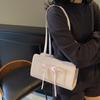 Bolsa de axila com textura de nicho bolsa feminina 2025 nova moda bolsa tote com laço coreano bolsa de ombro portátil para o dia a dia
