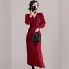 Comércio Exterior Roupas Femininas Outono/Inverno 2025 Vestido de Tricô Feminino Gola V Manga Bufante Cinto Acinturado Fenda Saia Longa Exibição Elegante
