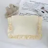 Bolsa de maquillaje con volantes estilo Ins, bolso de mano simple y elegante, bolsa de almacenamiento impermeable de nailon de color liso de gran capacidad