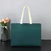 Bolsa Sacola de Tecido Não Tecido Tridimensional Tendência Espessa para Loja de Roupas Femininas e Infantis Bolsa de Compras Logo Personalizado