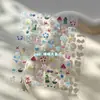 Al por Mayor en Stock Pegatinas para Uñas Nuevo Dibujo Animado Lata Pequeña Luz de Concha de Alta Calidad con Rejilla Adhesiva Trasera Lazo Xiaohongshu