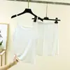 Nuevo modelo de verano conjunto de dos piezas de seda ECO color liso sin mangas, camisola y shorts para mujer, conjunto ligero para casa, pijama
