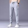 Calças casuais transfronteiriças, calças retas masculinas da moda, calças de seda gelada, calças skinny, calças de comércio exterior, calças masculinas de primavera e outono