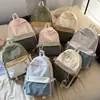 Mochila escolar transfronteriza nueva de alto valor para niñas, mochila de retazos de nicho para estudiantes, bolsa de doble hombro ligera de gran capacidad para estudiantes de secundaria y preparatoria