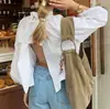 Camisa Branca Casual de Gola Alta Estilo Francês para Mulheres 2026 Novo Design com Mangas Bufantes, Costas Abertas com Amarração Top Solto