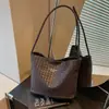 Bolso de Hombro Versátil de Gama Alta de Nicho para Mujer 2026 Nuevo Estilo Coreano Moda Retro para el Trabajo Bolso Tote con Textura Tejida para Mujer
