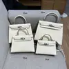 Bolsa Kelly Segunda Geração Mini Couro Genuíno Feminina 2025 Nova Moda de Luxo Bolsa de Ombro Transversal Bolsa Pequena Portátil para Mulheres