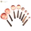 Copo medidor colher medidora de aço inoxidável banhado a cobre transfronteiriço conjunto de 8 peças cabo de madeira de nogueira rosa dourado 4 peças copo medidor colher medidora Amazon