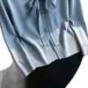 Fotos reales del cárdigan de punto con cuello en V y lazada estilo francés para otoño/invierno 2026, una prenda exterior elegante y favorecedora.