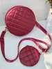 Bolsas para Mujer 2025 Nueva Color Sólido Acolchada Bordada Cruzada Pequeña Redonda con Billetera Moda Comercio Exterior Mayoreo