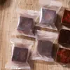 Açúcar mascavo embalado individualmente, cubos pequenos tradicionais feitos à mão no estilo Yunnan, açúcar vermelho e preto natural autêntico para o pós-parto e o período menstrual