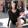 2025 Início do Outono Cor Pura Branco Decote V Solto Preguiçoso Elástico Manga Longa Camiseta Feminina Solta Estilo Coreano Aparência Emagrecedora Roupa de Baixo