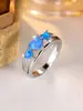 Venta Caliente Transfronteriza Anillo para Mujer Corazón Azul Ópalo de Lujo Ligero Europeo y Americano Anillo Retro de Tres Corazones Apilados Incrustado con Diamante Brillante