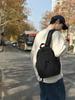 Mochila informal de color sólido para viajes transfronterizos, nueva mochila pequeña ligera para viajes de comercio exterior, mochila escolar para estudiantes que combina con todo.