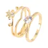 Elegante conjunto de dos piezas de anillos huecos de corona incrustados con circonita, regalo de vacaciones, versátil y elegante, joyería de anillo para mujer de cobre puro