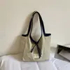 Bolsa de Lona Doble Cara Estilo Nuevo 2026 Transfronteriza para Mujer, Bolso de Hombro Gran Capacidad Estilo Perezoso, Bolsa de Mano Versátil para Viajes Diarios