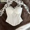 Corsé de estilo vacacional con tirantes blancos, patchwork de lunares blancos y negros, entallado a la cintura y con ballenas