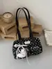 Bolso de hombro y axila de lunares de moda transfronteriza de nicho para mujer, nuevo bolso de mano para commuting 2026, bolso Boston, bolso almohada