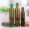 Fabricantes de botellas de vidrio al por mayor botella de 500ml para té aceite de oliva botella de aceite de nuez botella de aceite de sésamo botella verde oscuro para salsa vinagre botella vacía