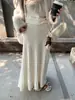 Falda midi plisada tejida de pelo de mapache engrosado para mujer, nuevo estilo otoño/invierno 2026, versátil, adelgazante, con una caída fluida y un dobladillo ancho, a la moda