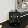 Mochila Retrô Britânica para Mulheres 2026 Nova Moda Versátil Bolsa de Ombro Transversal Bolsa de Mão com Toque de Luxo Mochila de Estudante