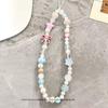 Cadena para teléfono móvil estilo Ins Versátil Lanyard colgante para funda de teléfono móvil para mujer Anti-caída Lanyard corto Ccd Cadena colgante de dopamina