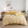 Conjunto de Flanela Escovada Muji Estilo Japonês de Quatro Peças, Conjunto de Roupa de Cama para Casa com Xadrez Pequeno Retrô, Amigo da Pele, Universal para Todas as Estações