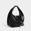 Bolsa triangular de couro macio para bolinho de arroz, novo design 2026, estilo nicho, bolsa tote casual texturizada, bolsa de ombro de alta qualidade, bolsa transversal