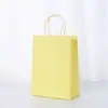 Punto 26 Color sólido Bolsa de mano de papel Kraft para llevar a mano Bolsa de regalo Bolsa de papel de envolver estilo Ins venta al por mayor