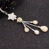 Colgante de bola de cristal para espejo retrovisor de coche, colgante de metal, adorno colgante interior, decoración de coche, adorno colgante de pedrería