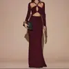 Ropa transfronteriza europea y americana para mujer, nuevo producto de otoño 2026, vestido elegante y moderno de manga larga con diseño de patchwork calado, corte ajustado para mujer