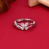 Anillo envolvente de trébol de cuatro hojas para mujer, moderno diseño de micro pavé, nuevo estilo 2026, elegante, de nicho, único, de lujo ligero, anillo versátil