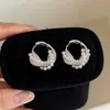 Elegante HerederaEstilo Fresco Bolso de Lunares Plateados Arete Arete Único Mujer 2026 Aretes Súper Hermosos