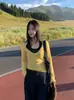Moda Nova de Outono Antecipado de Dongdaemun, Coreia do Sul: Conjunto de Duas Peças de Tricô Longa com Listras Contrastantes e Decote Halter de Alta Qualidade