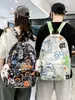 Mochila Graffiti Estilo Harajuku Japonés de Moda para Hombres y Mujeres, Mochila Simple y Versátil para Estudiantes Universitarios