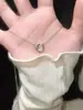 Collar con Anillo de Mobius de Acero de Titanio que No se Desvanece Ins Elegante Nicho Lujo Accesible Diseño de Gama Alta Cadena Versátil para la Clavícula