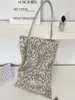 Bolso casual de nailon con estampado de leopardo para mujer, nuevo y moderno 2026, ligero, versátil, para el trabajo, bandolera, bolso de mano de moda para Instagram