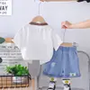 Traje de verano para niños estilo western popular en internet de manga corta 2025 Nuevo traje de verano para niños con cabeza de oso de pegatina de manga corta Moderno