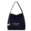 Bolsa de Ombro Bordada com Letras de Design de Nicho Mais Vendida, Bolsa de Tecido Versátil de Grande Capacidade, Bolsa Tote Moderna para Compras