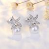 Pendientes de plata s925 populares de Corea, personalidad femenina, tendencia Joker, temperamento de estrella de mar, pendientes de oro con perla, venta al por mayor